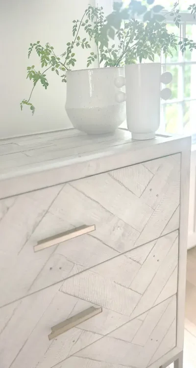 Bureau with three drawers and two plans on top